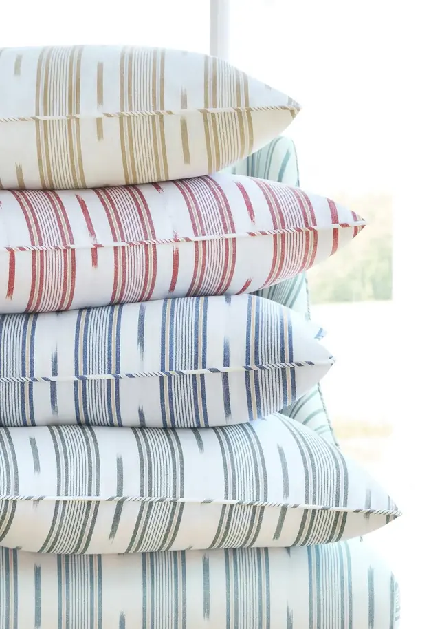 Striped linen fabrics shown in a range of natural and coloured designs