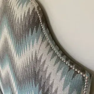 Studded edge upholstered headboard
