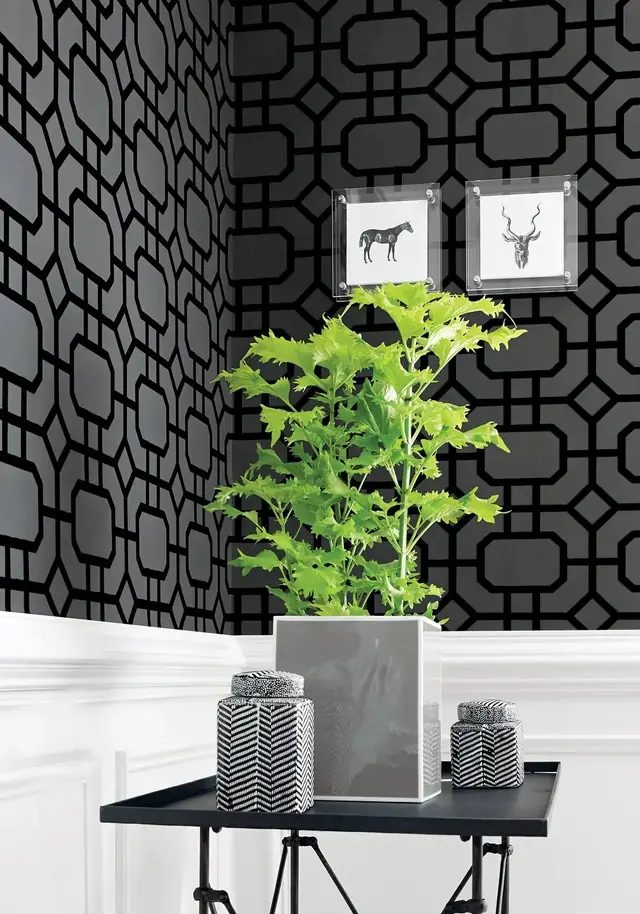 Thibaut Portier black geometric flock wallpaper in a monochrome interior
