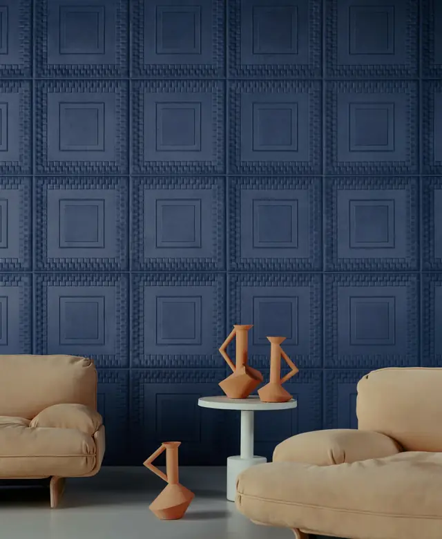 Deep navy 3D panel wallcovering showing repeated square architectural relief
