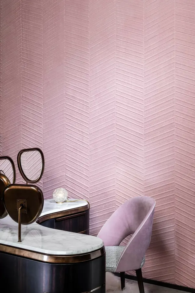 Pink parquet-inspired 3D wallcovering with raised chevron relief