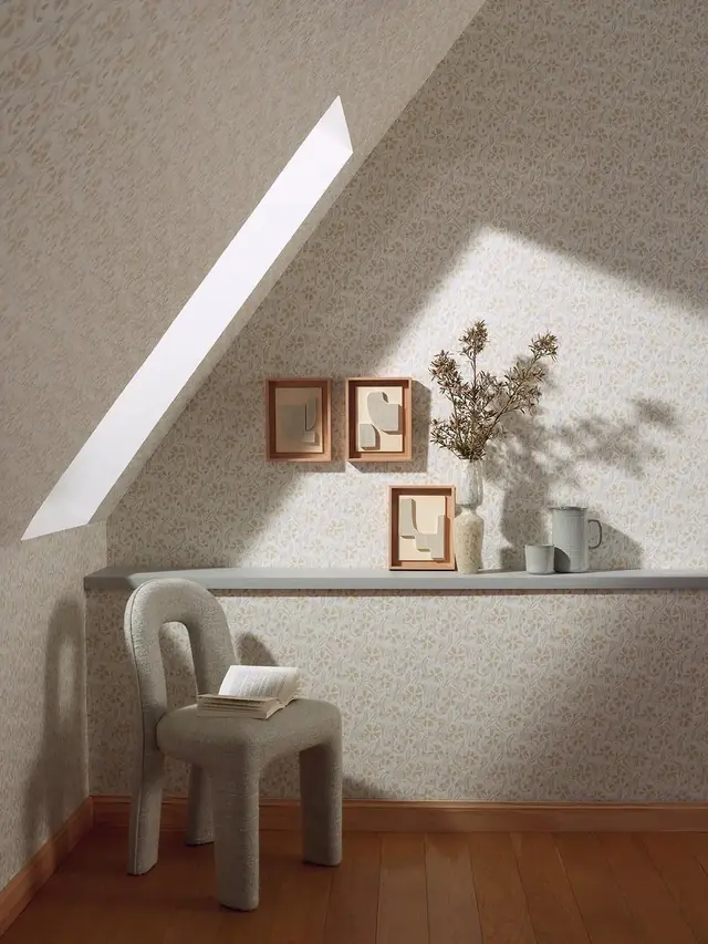 Cream designer wallpaper with an elegant small-scale pattern in a light interior