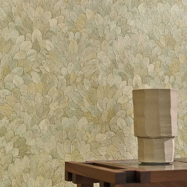 Soft green botanical wallpaper with layered leaf motifs