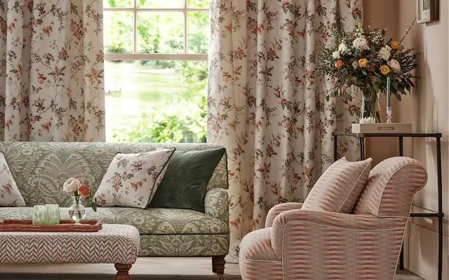 Floral curtains in a coordinated living room interior