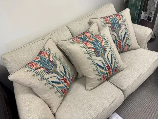 Made-to-measure embroidered cushions made by TM Interiors