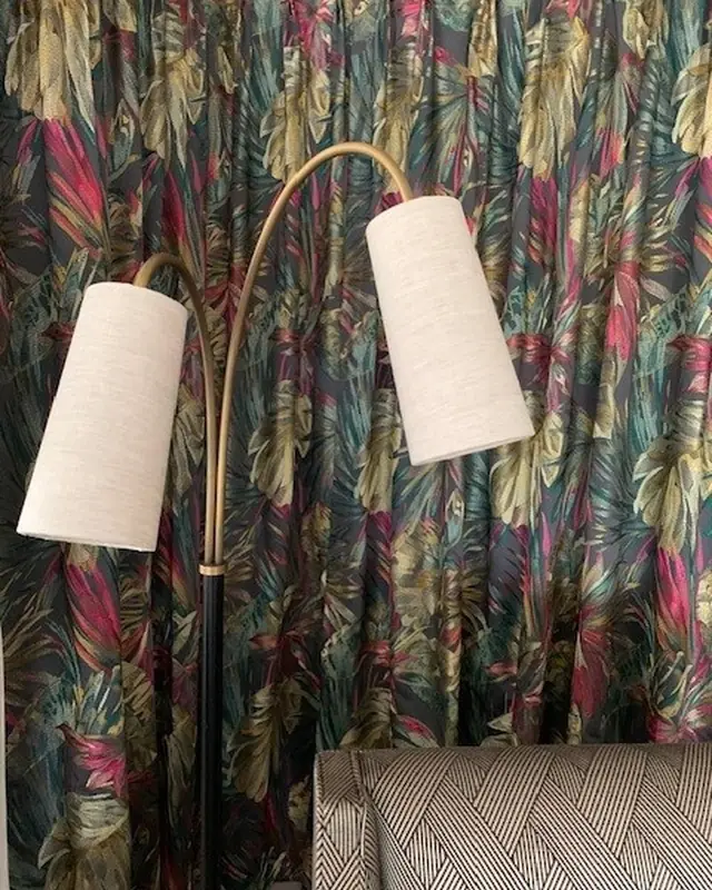 Colourful botanical curtains made by TM Interiors and displayed in the showroom