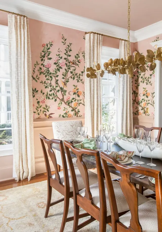 Pink floral wallpaper with green leaves in an elegant interior