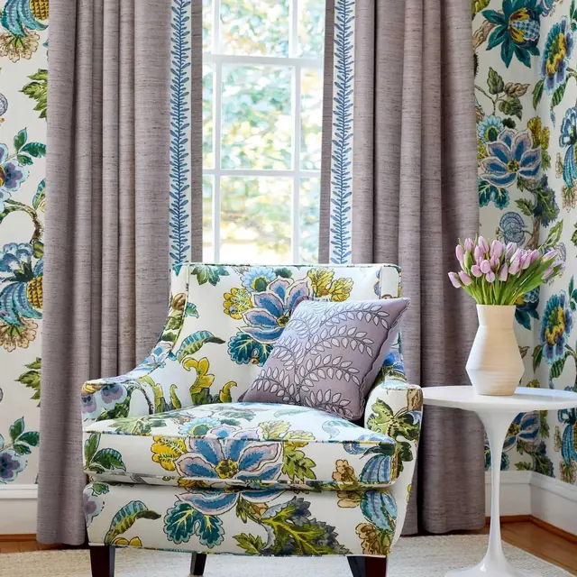 Traditional blue and green botanical fabric used for curtains and upholstery