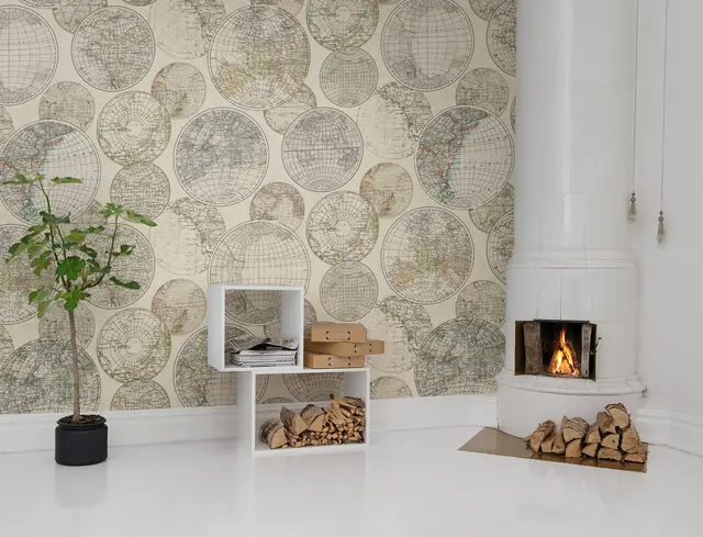 Illustrated globe and travel wallpaper in an interior