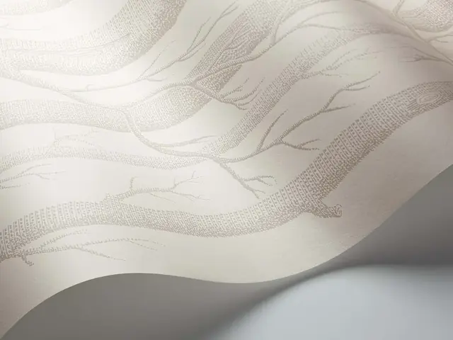 Close-up of neutral Cole and Son Woods wallpaper showing printed tree detail