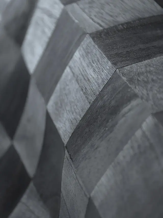 Close-up of a sculptural wallcovering with geometric raised relief
