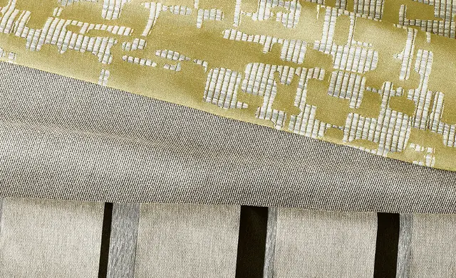 Selection of washable furnishing fabrics in neutral, yellow and textured colourways