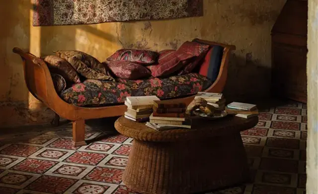 Richly layered Zoffany textiles in a characterful interior