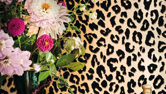 Animal print wallpaper featuring exotic patterns in a modern space.