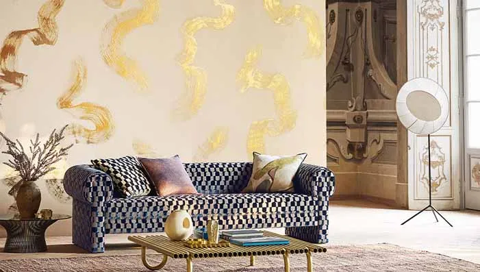 Elegant black fabric upholstery on a modern chair, featuring a black and gold upholstery fabric pattern.