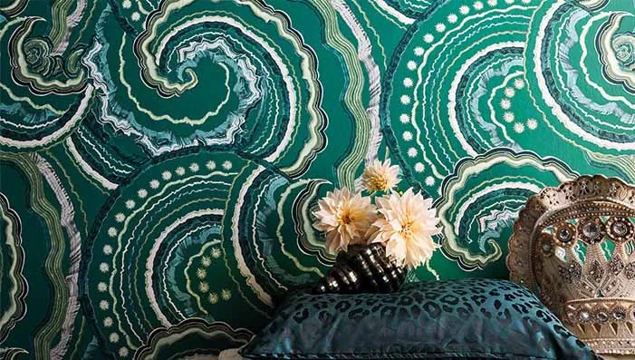 Green feature wallpaper with a subtle, textured design that enhances natural interiors.