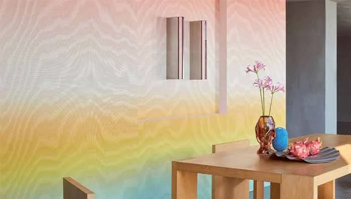 Moire wallpaper with intricate patterns creating depth in a stylish room.