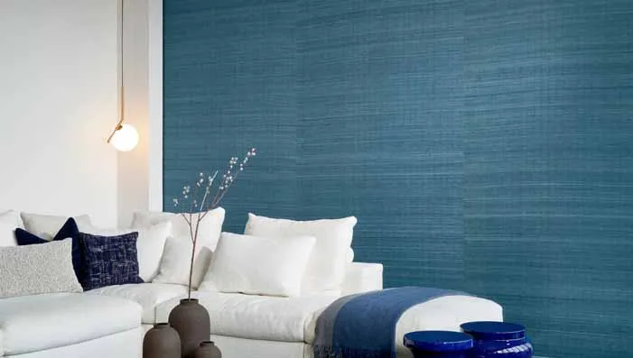 Luxurious bedroom with silk wallpaper providing a smooth, opulent finish.